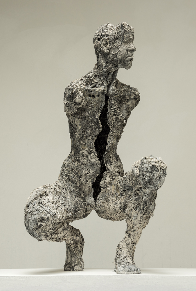 Divided; plaster, mixed media