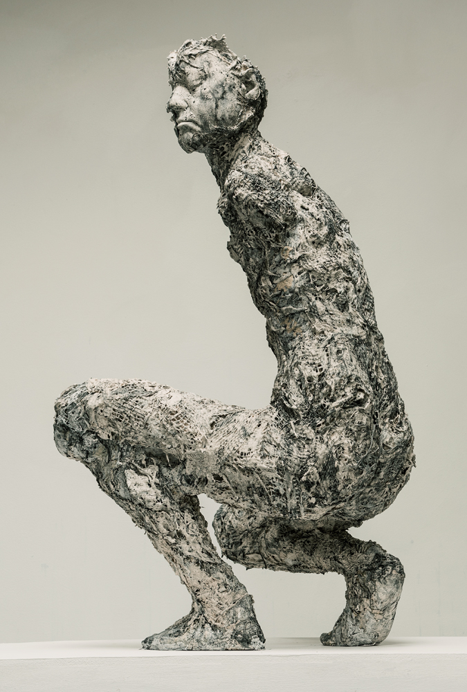 Divided; plaster, mixed media